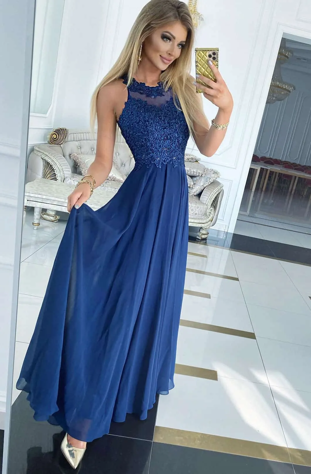 Elegante abito in tessuto velato di colore blu scuro