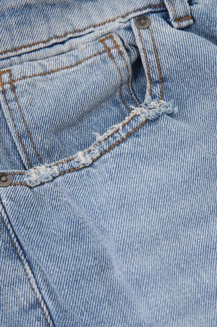 Jeans slim-fit in puro cotone effetto délavé
