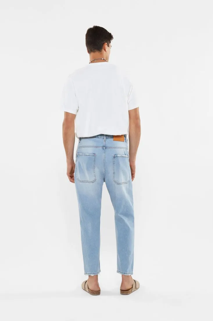 Jeans slim-fit in puro cotone effetto délavé