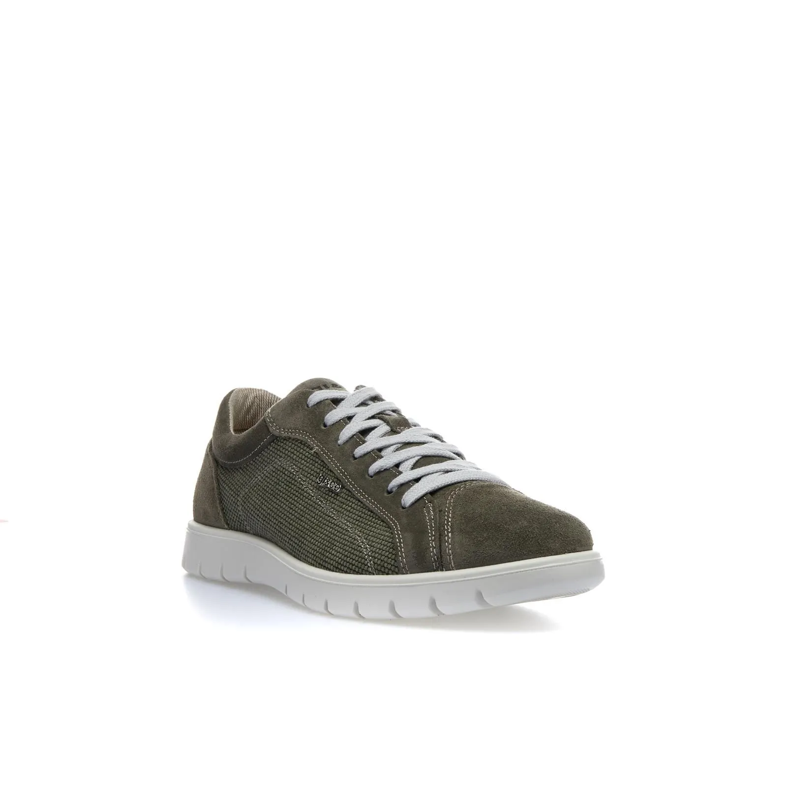 Sneakers verdi con suola a contrasto